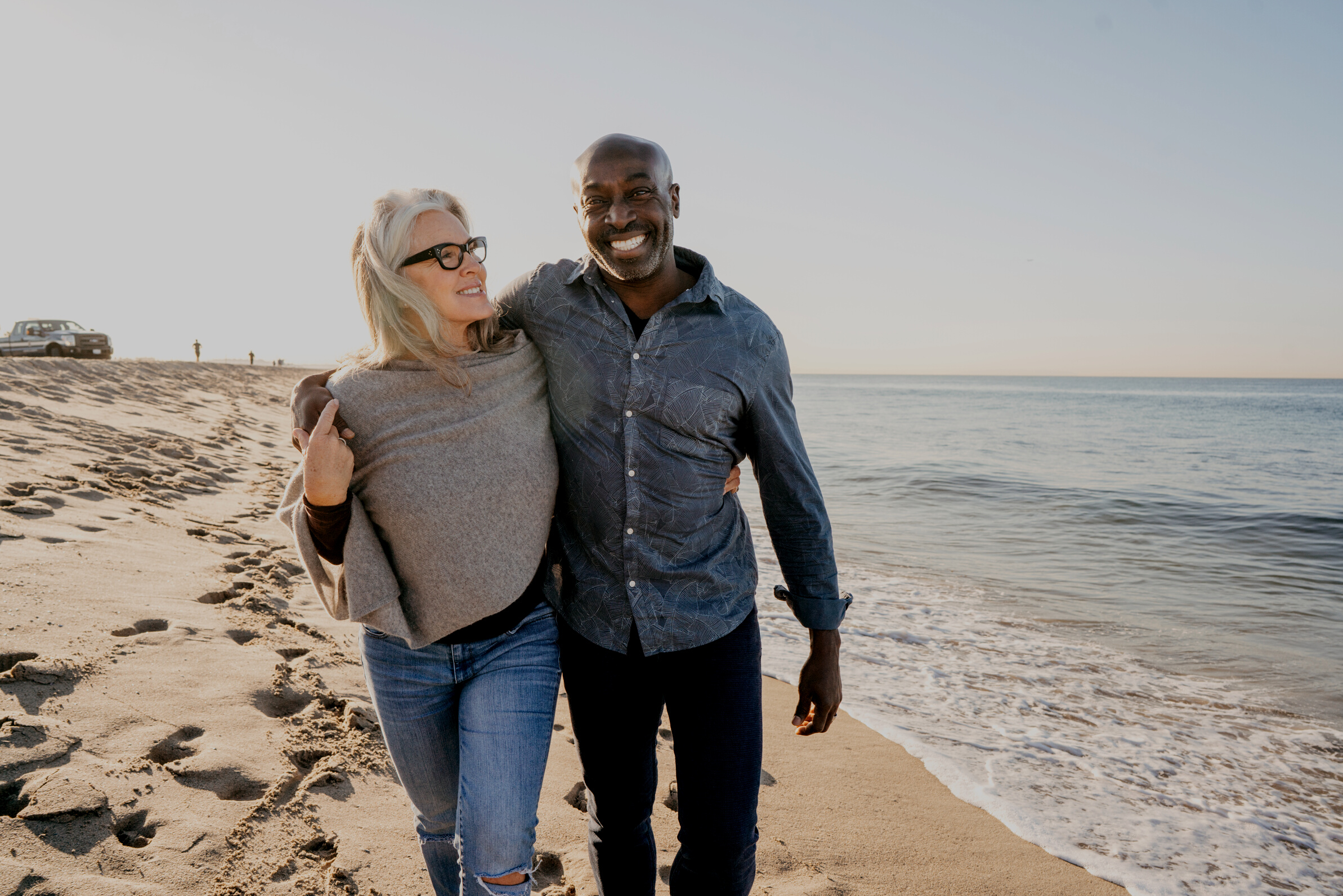 Happy interracial senior  couple on the beach